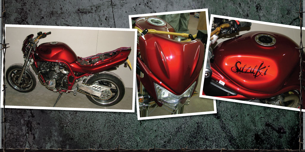 Suzuki bandit refinished in red candy with scrawly lettering